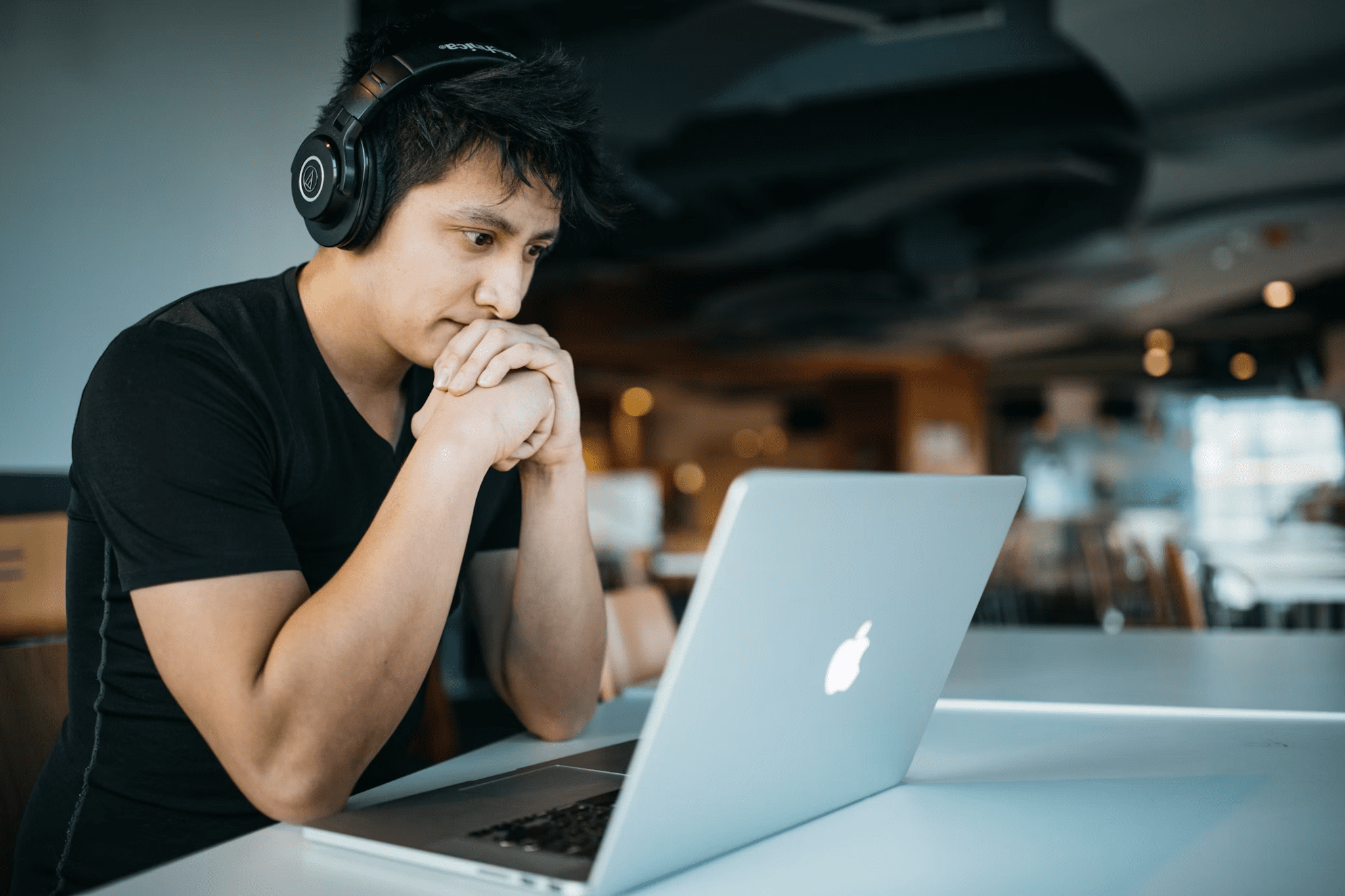 A college student using his laptop