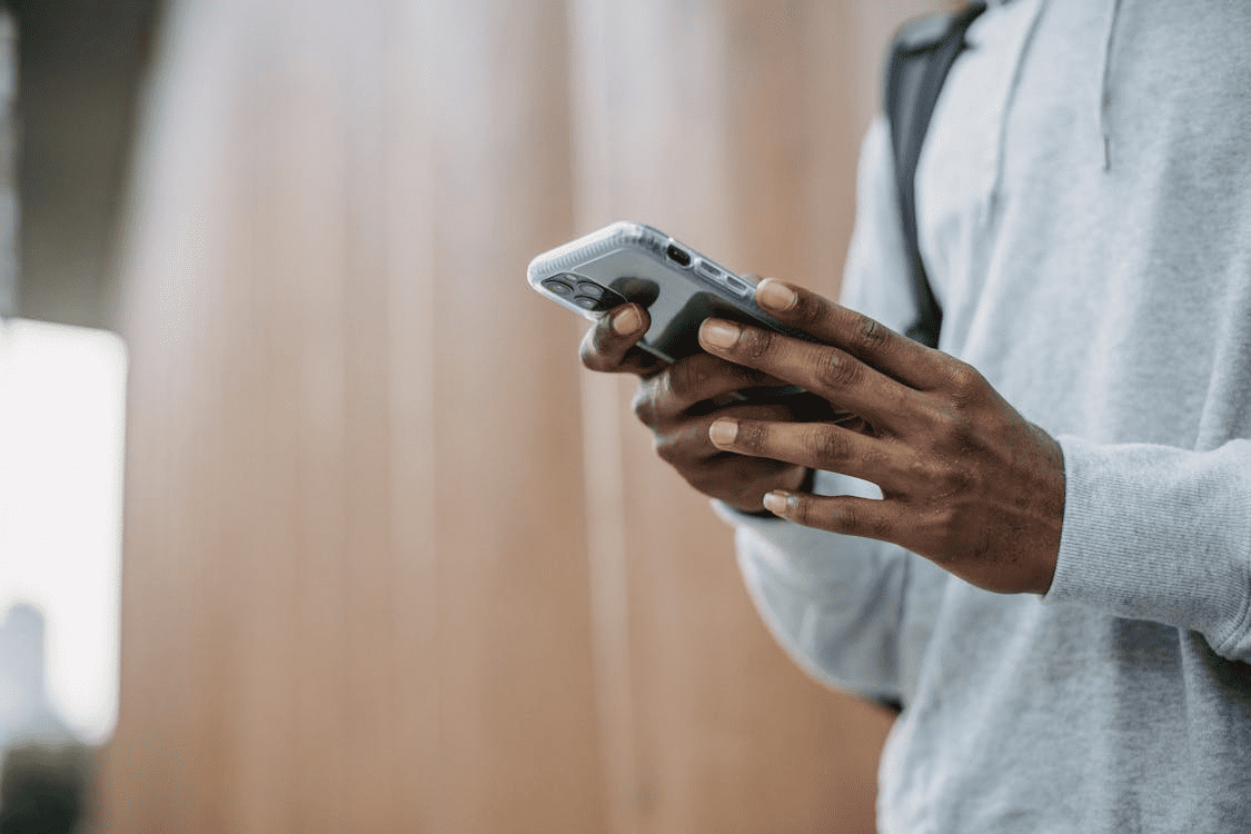 A person holding their phone