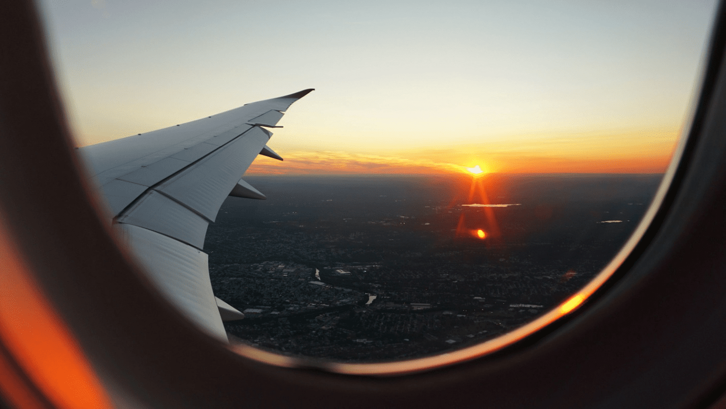 View of the sunset from a plane window