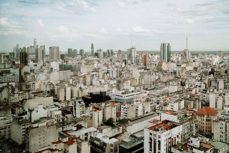 Global city skyline illustrating VPN access and bypassing geo-restrictions for streaming.