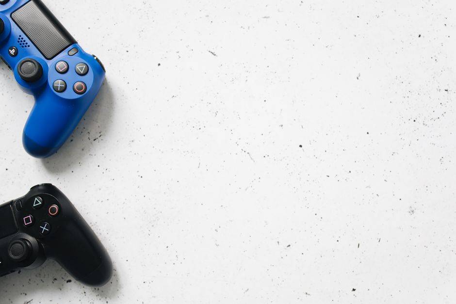 PlayStation and Xbox controllers illustrating VPN setup for gaming consoles