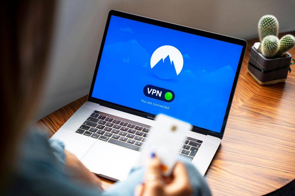 Laptop displaying Proton VPN interface and connected status, illustrating user experience reviews.